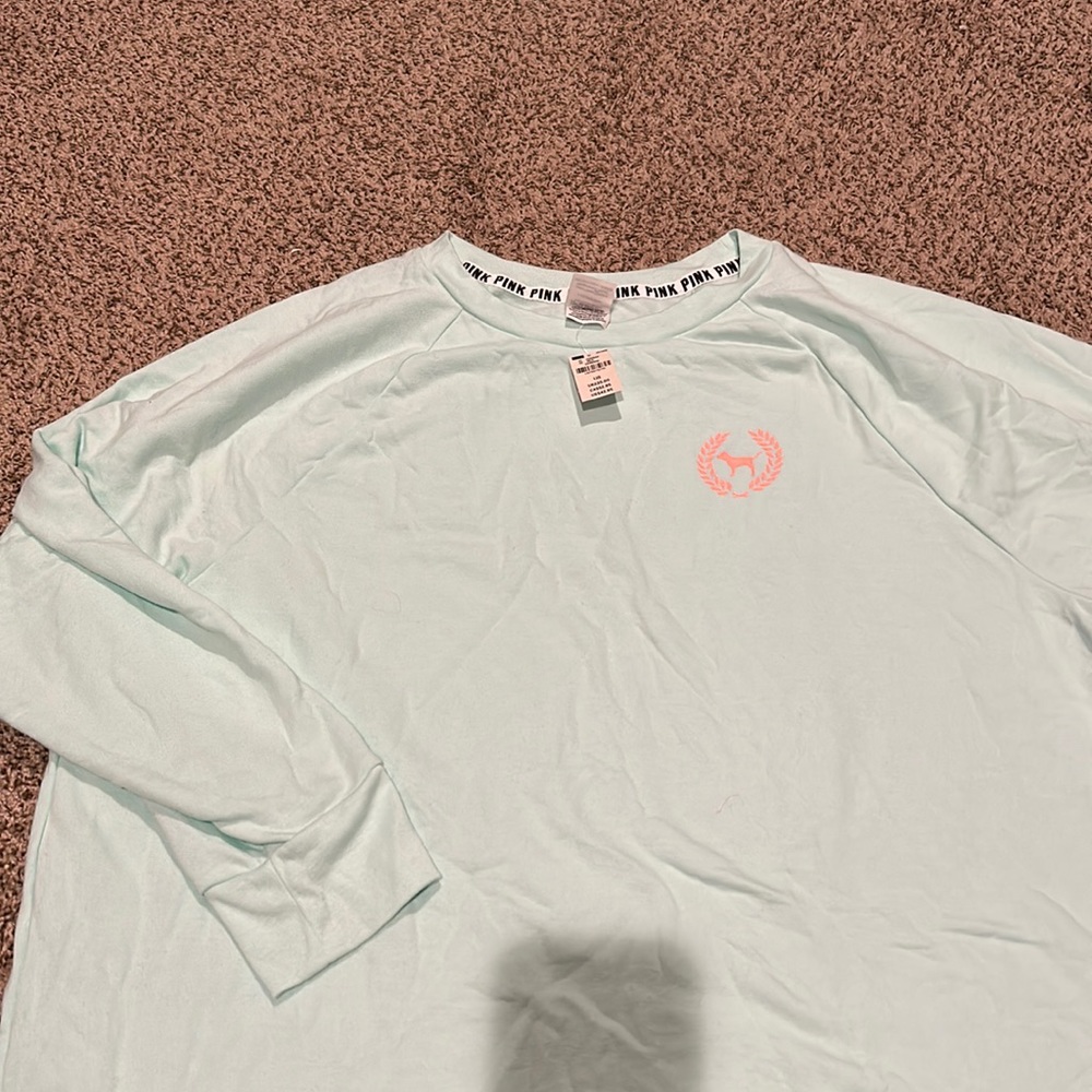New with tags PINK light blue pullover with coral logo size LARGE